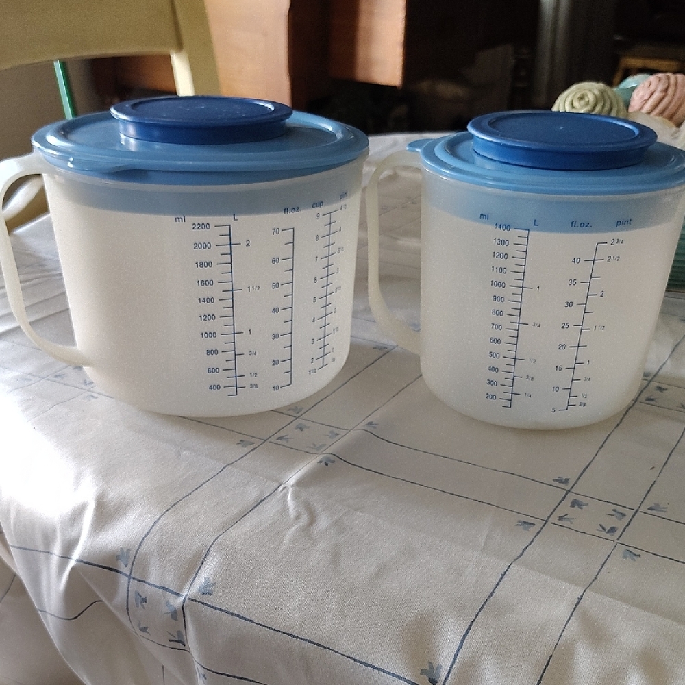 2 Vintage Blue and White Measuring Pitchers